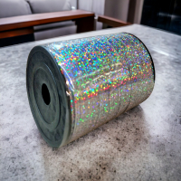 Panglica decorativa pentru baloane si cadouri argintie holografica 500 m0.5 cm